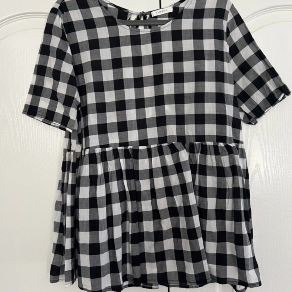 Peplum Top with Tie Detailing in Back